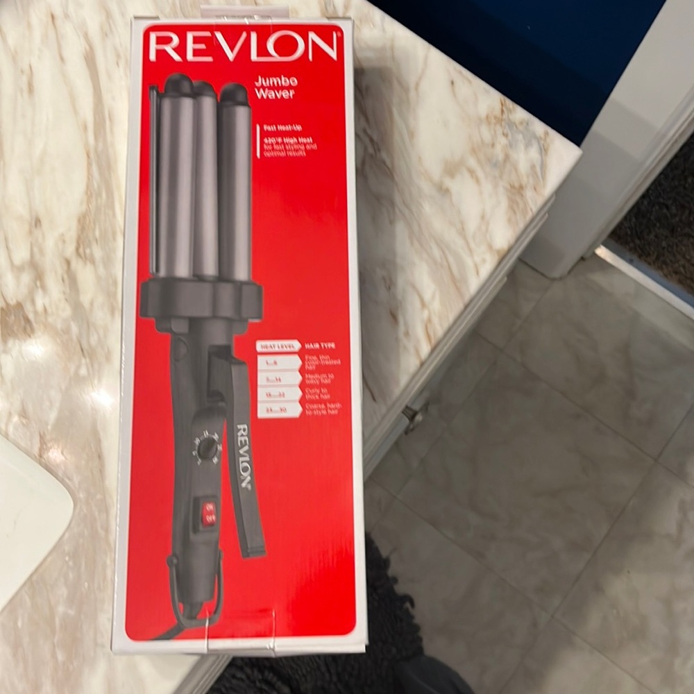 Revlon never opened. Jumbo waver